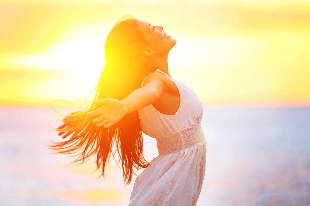 depositphotos 26073829 stock photo free happy woman enjoying sunset transformed